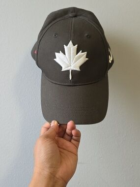 New Era Black Cap with White Maple Leaf